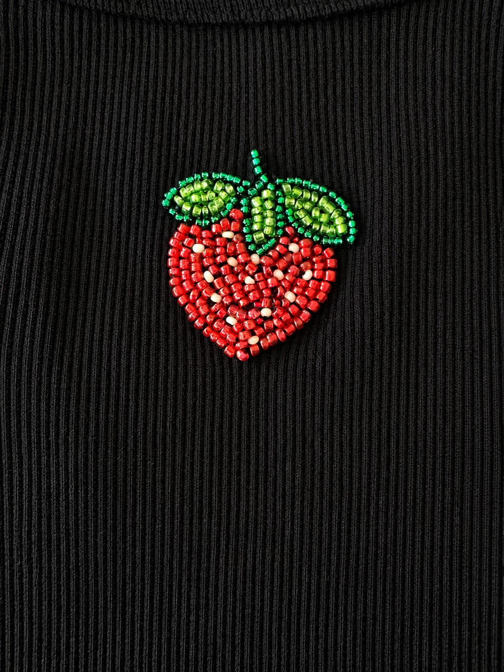 Strawberry tank top - flat lay